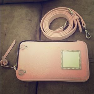 Bandolier light pink zip pouch and extended pouch.